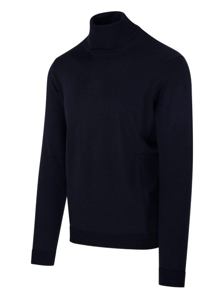 Maglione blu a collo alto in lana merino 