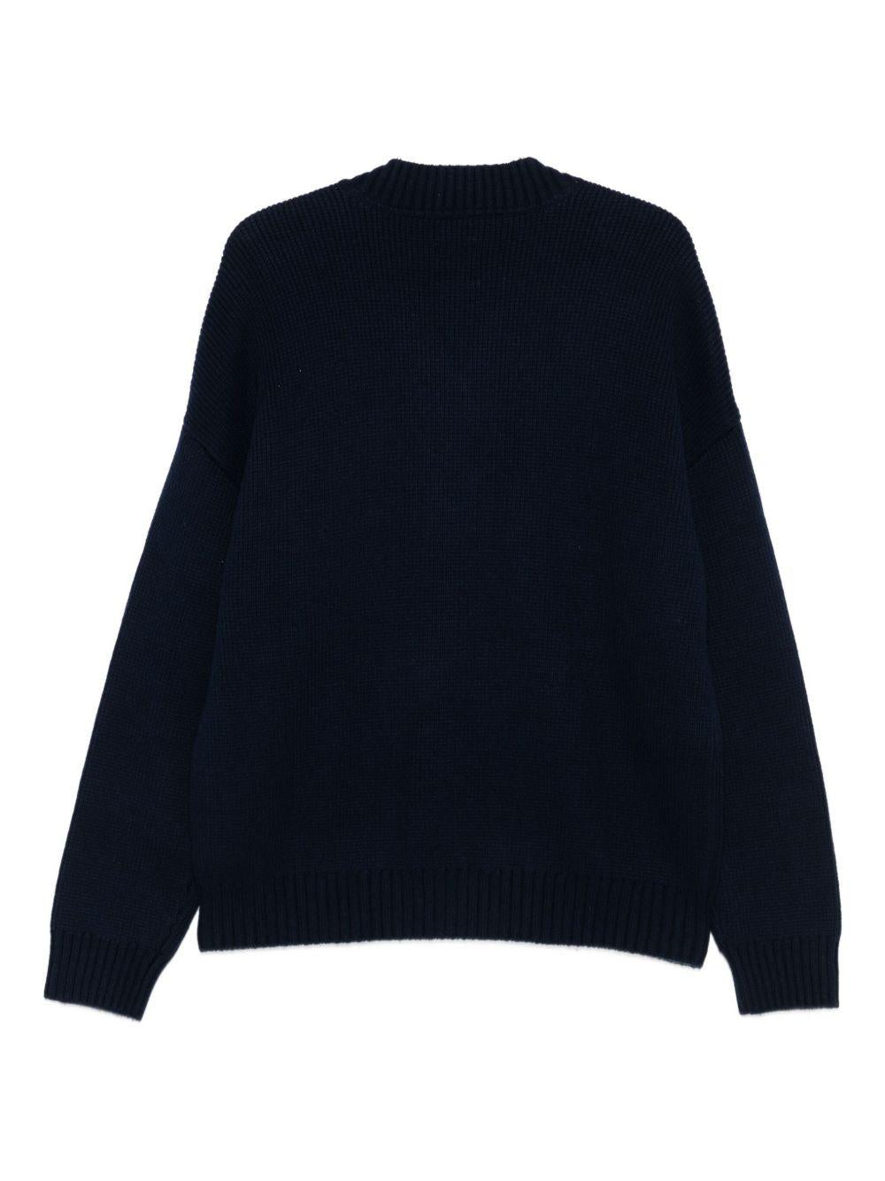 Maglione blu navy con scollo a V 