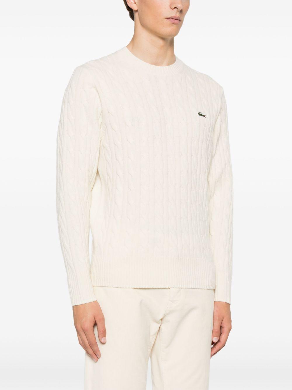 Maglione bianca a maglia intrecciata 