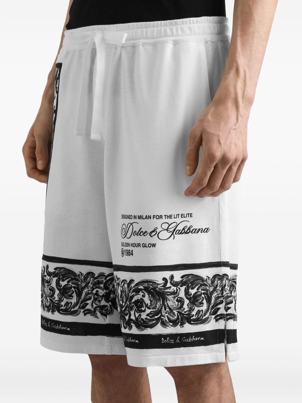 Shorts bianchi in cotone con logo 