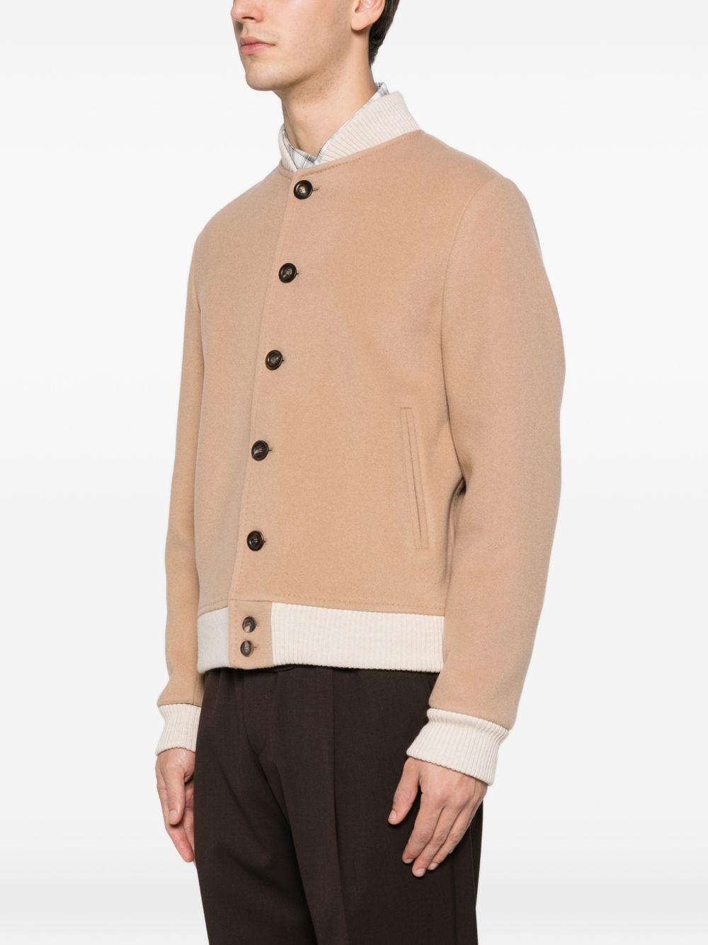 Bomber beige con bottoni 