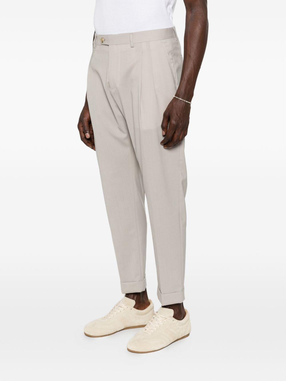 Pantaloni mastice con risvolto 