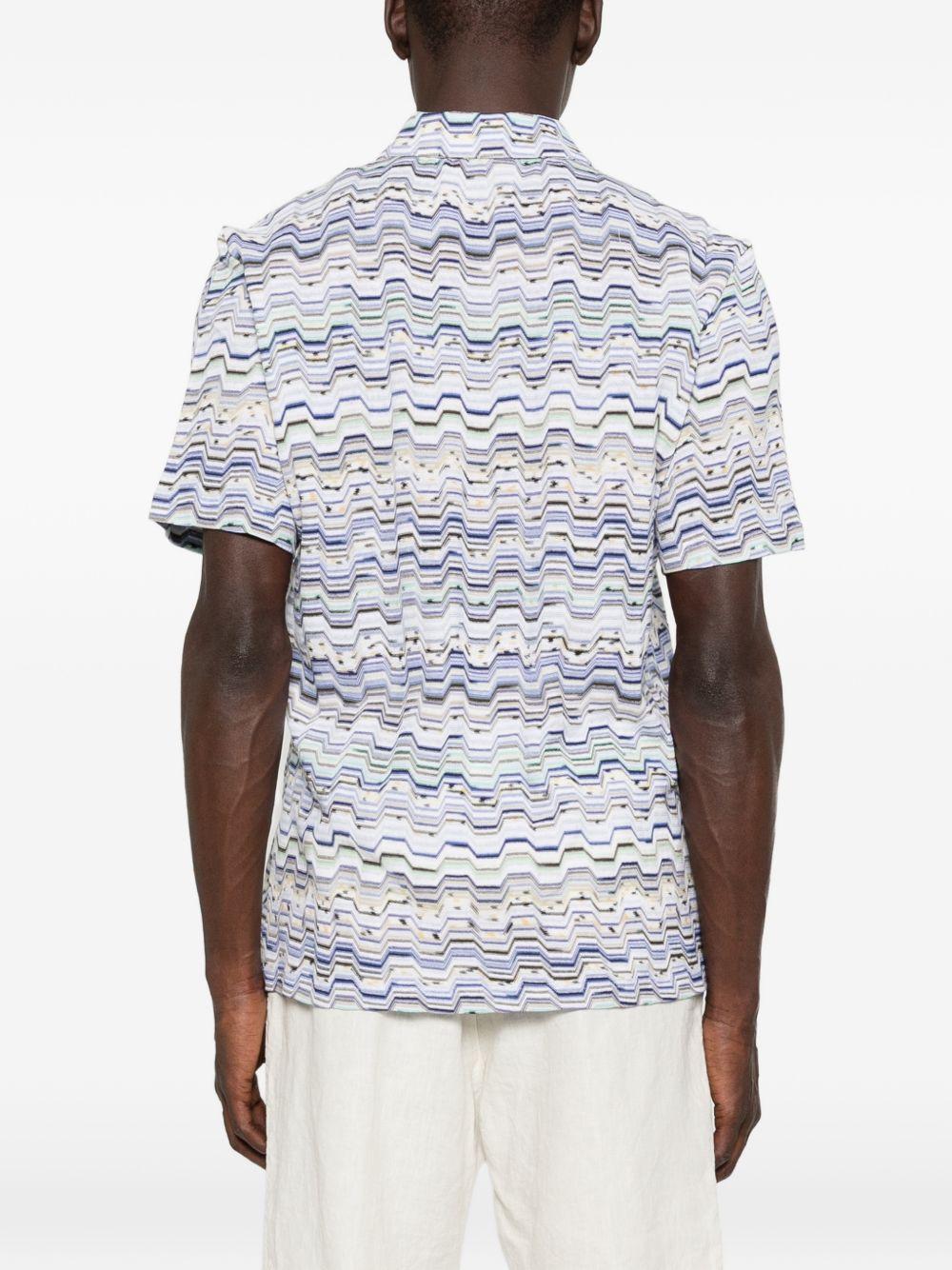 Polo light blu con motivo a zig zag 