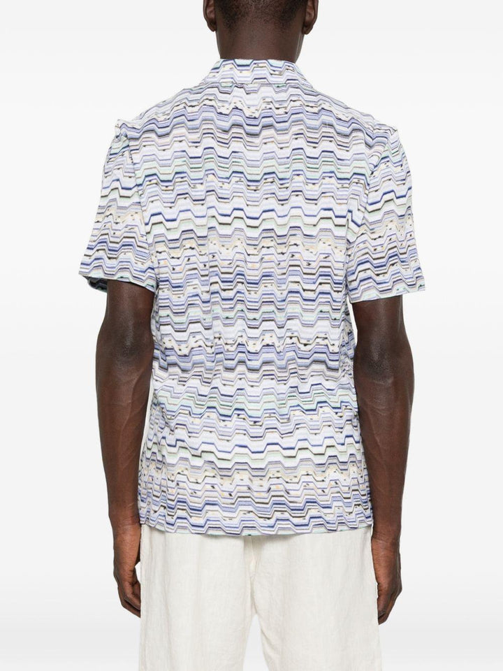 Polo light blu con motivo a zig zag 