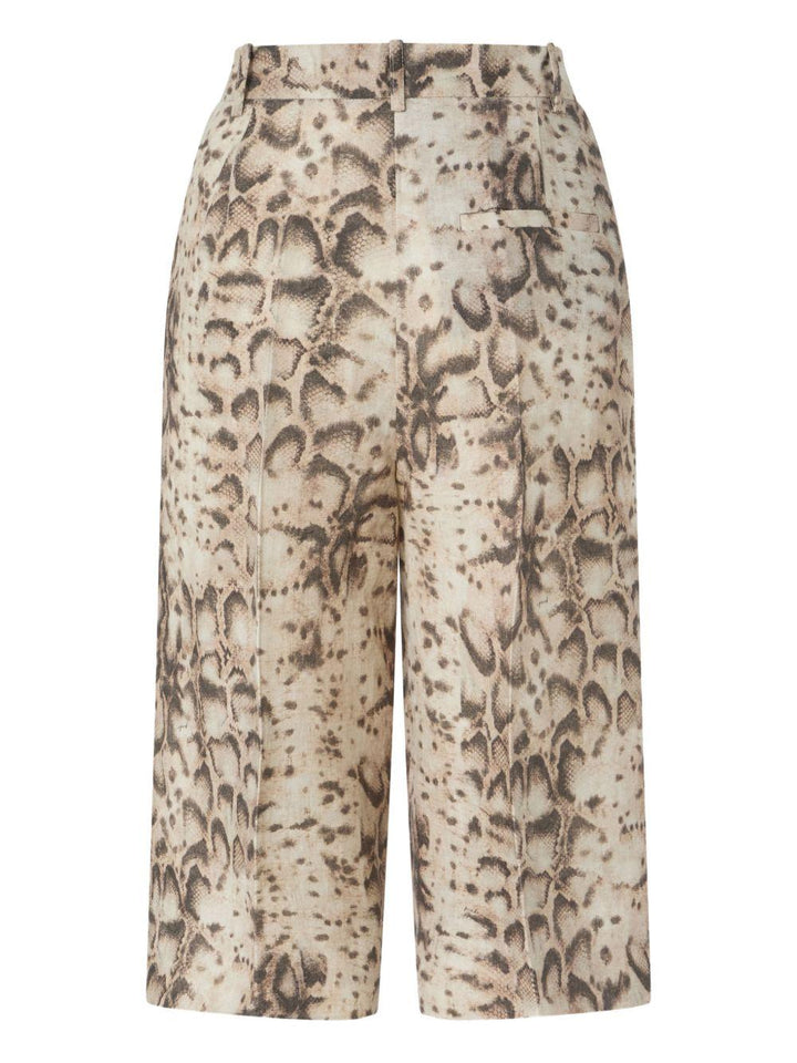 Pantaloni con stampa serpente 