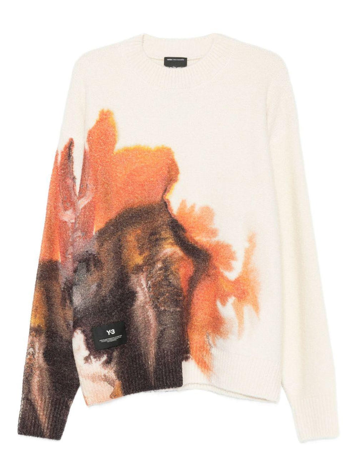 Maglione bianco con stampa grafica 