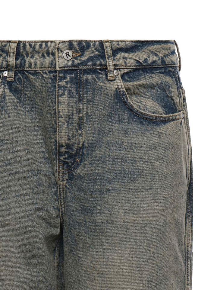 Jeans grigio scuro con bottoni 