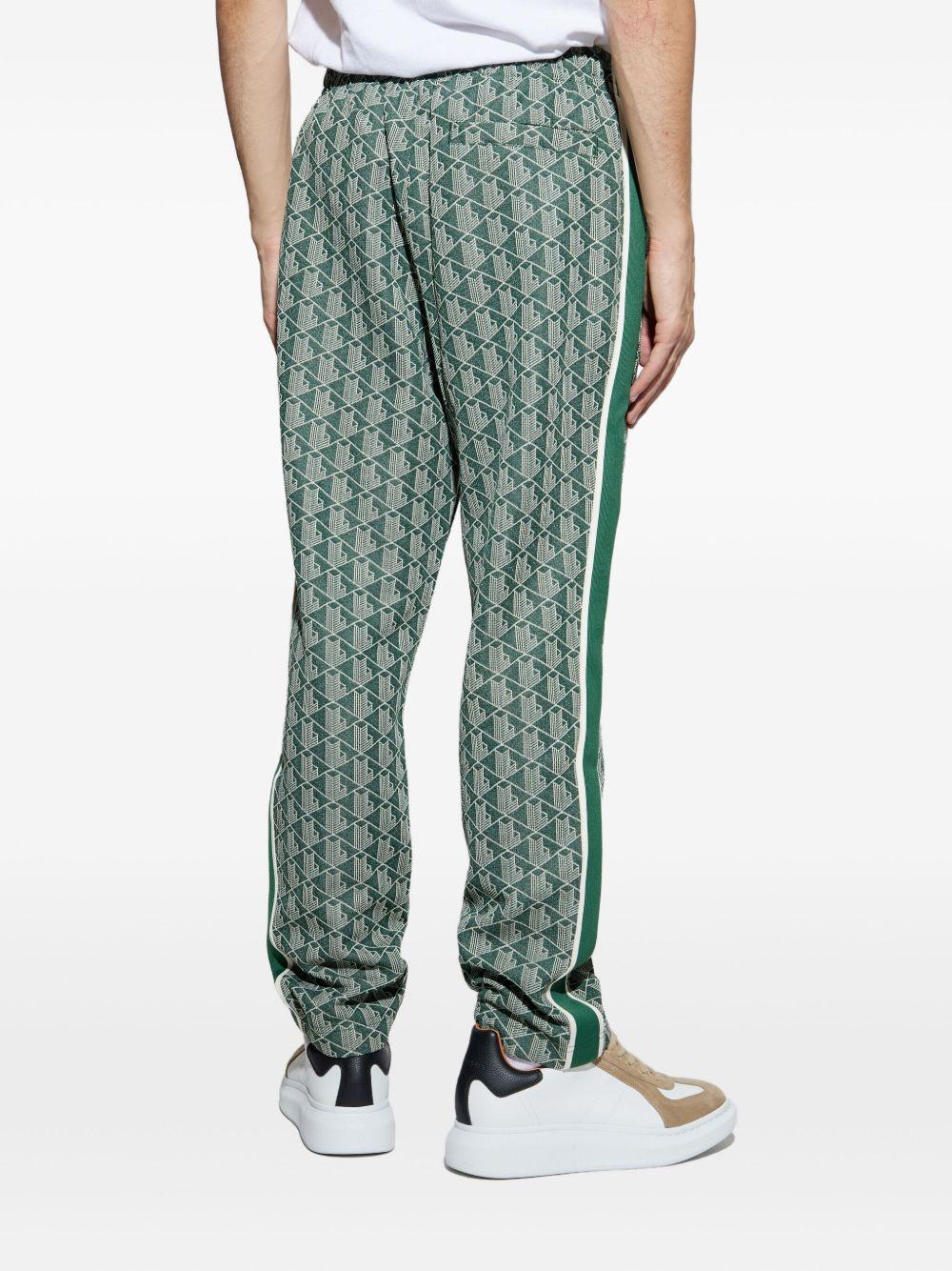 Pantaloni verdi con monogramma 