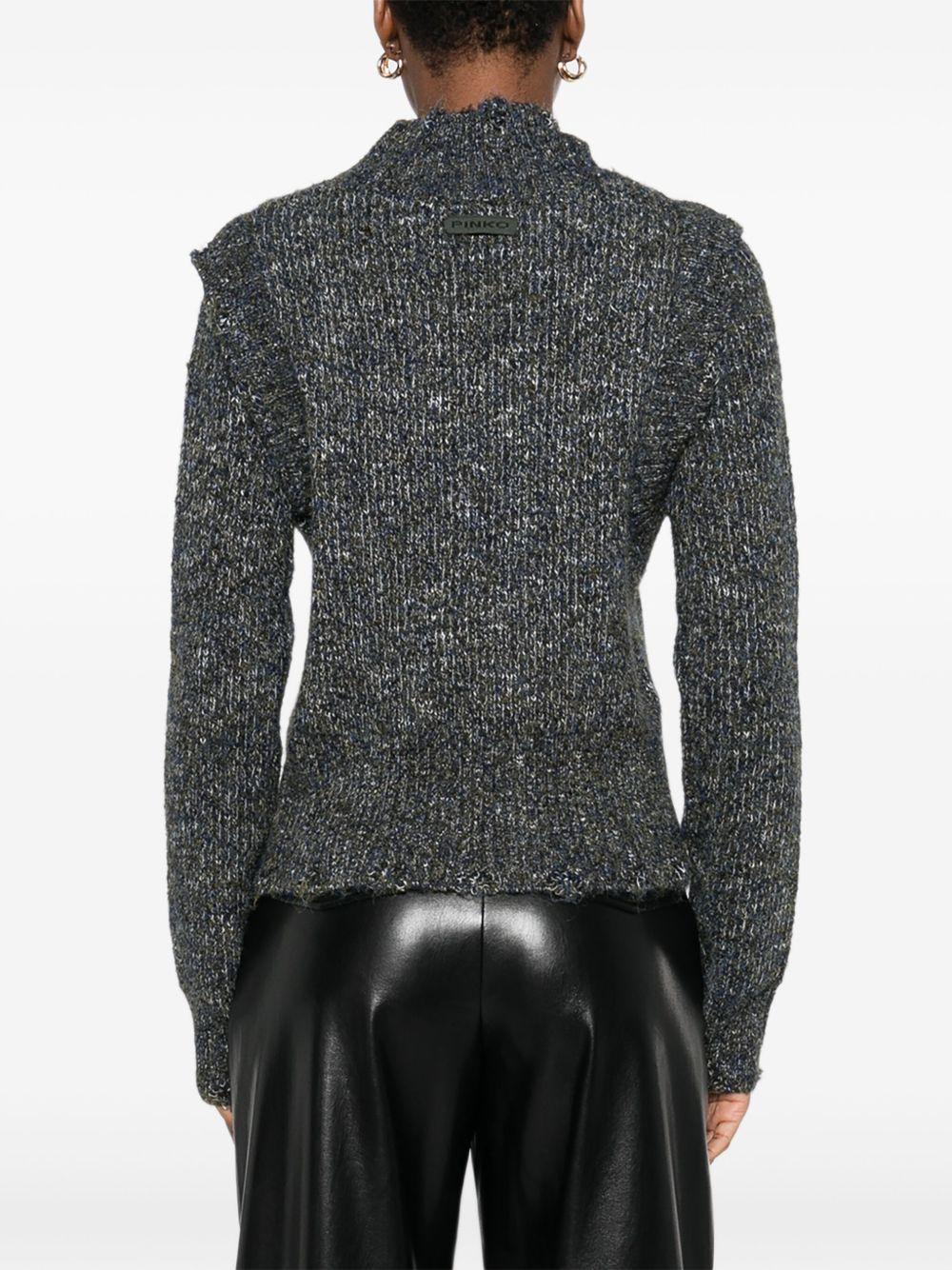 Maglione con  dettagli 