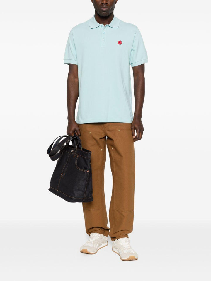 Polo con patch floreale glace 