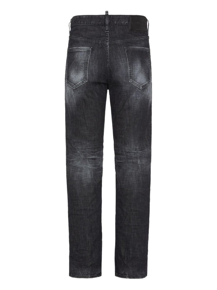 Jeans neri dritti con dettagli strappati 