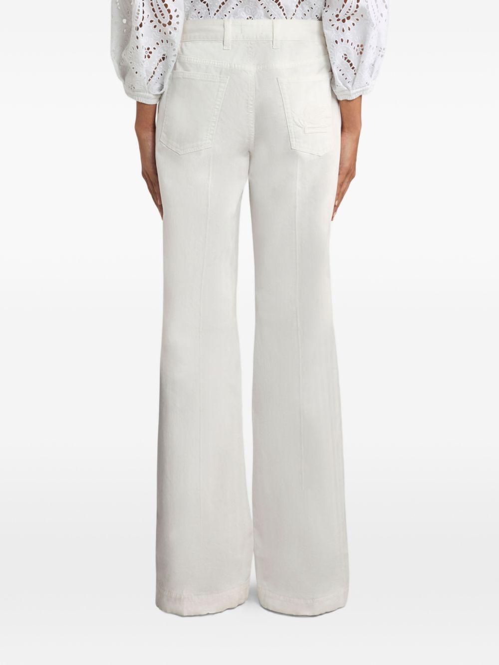 Jeans con ricamo Pegaso 