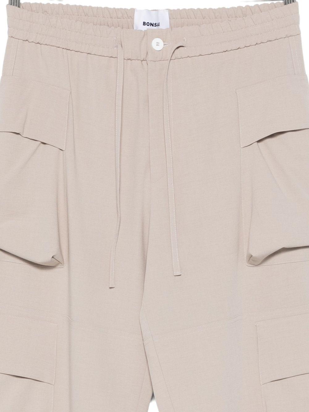 Pantaloni cargo beige con coulisse