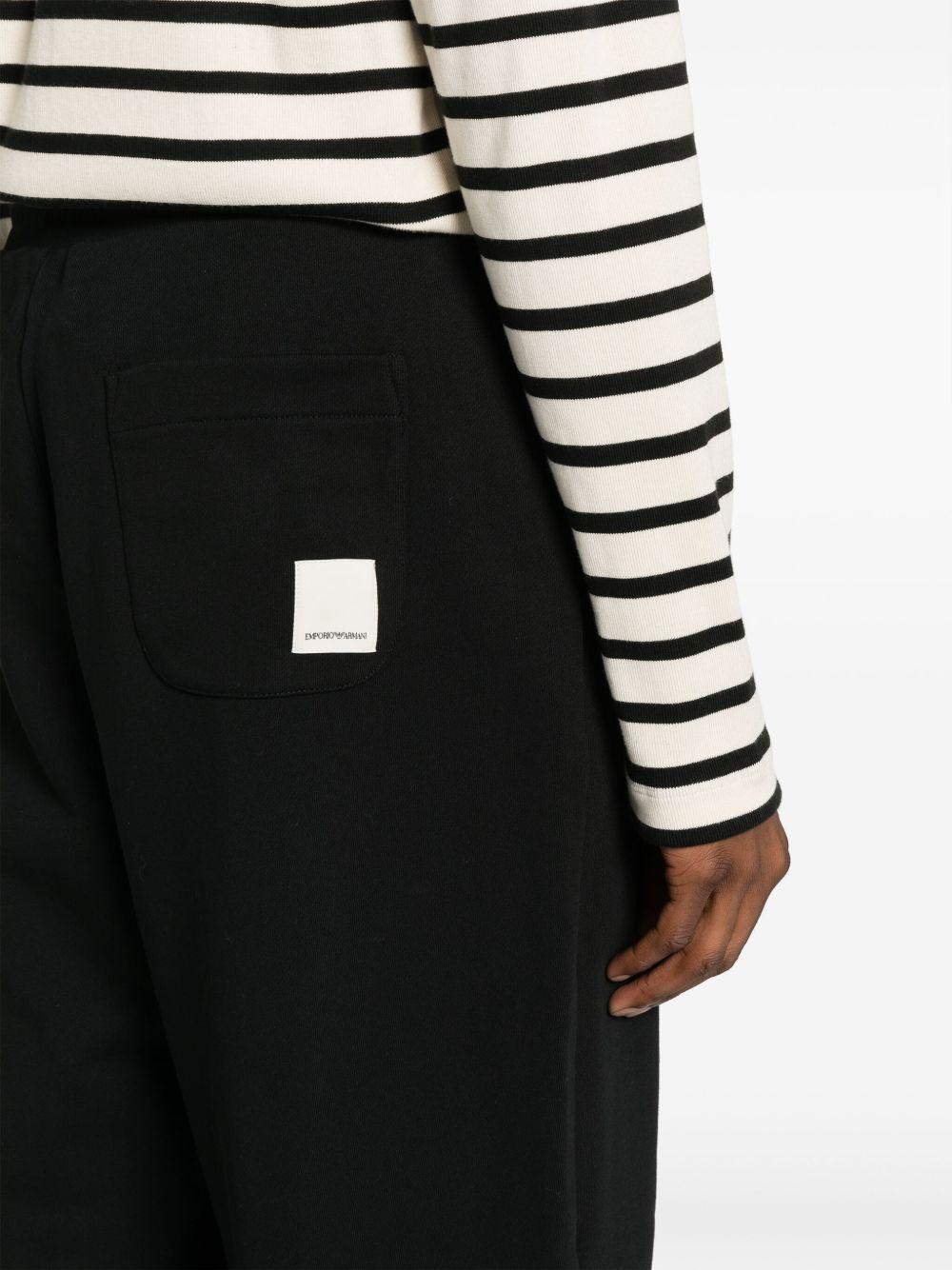 Track-pants in maglia nero 