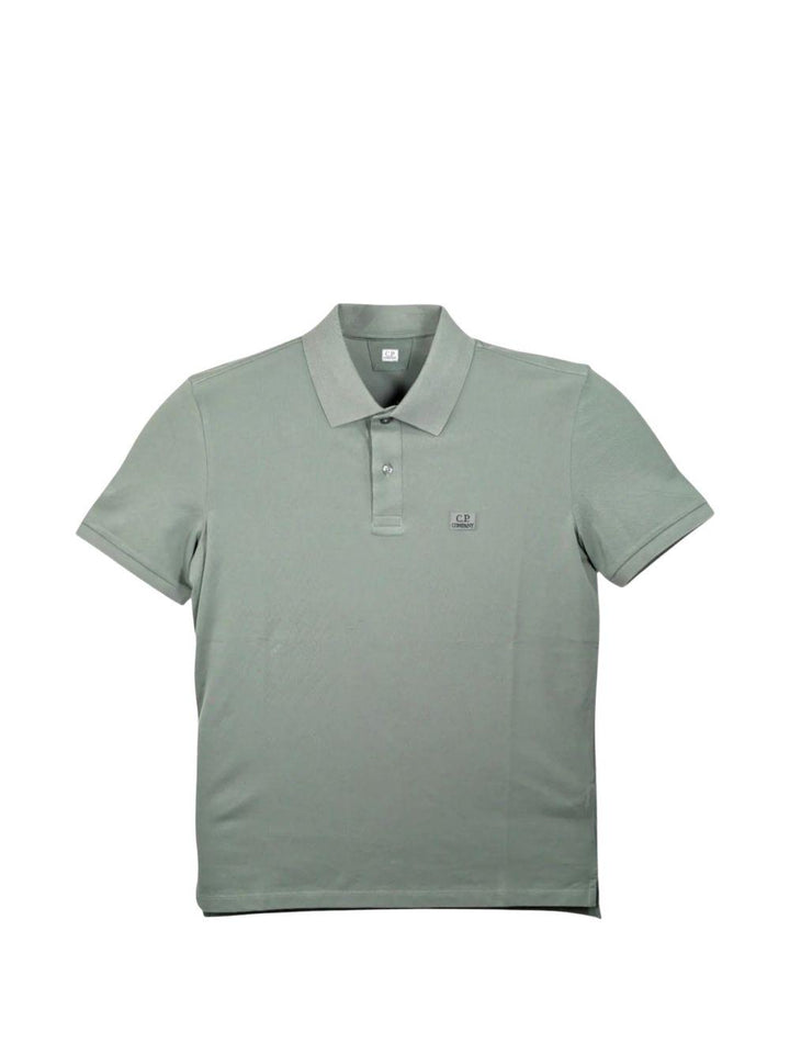 Polo verde con patch logo 