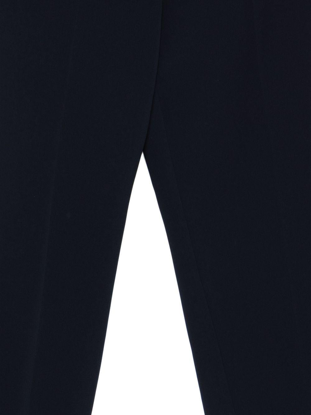 Pantaloni con bottoni 