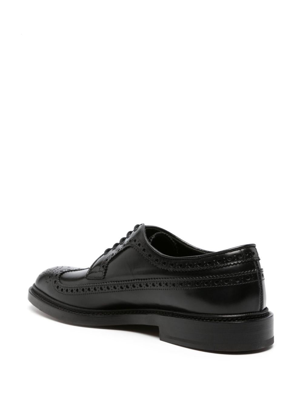 Brogues nere con inserti 