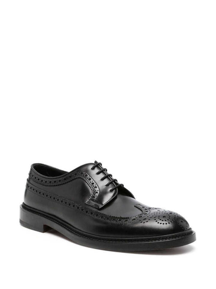 Brogues nere con inserti 