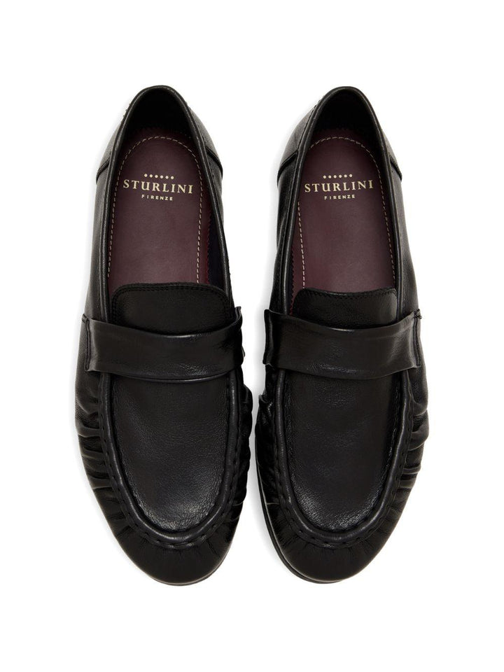 Mocassini neri in pelle a punta tonda 