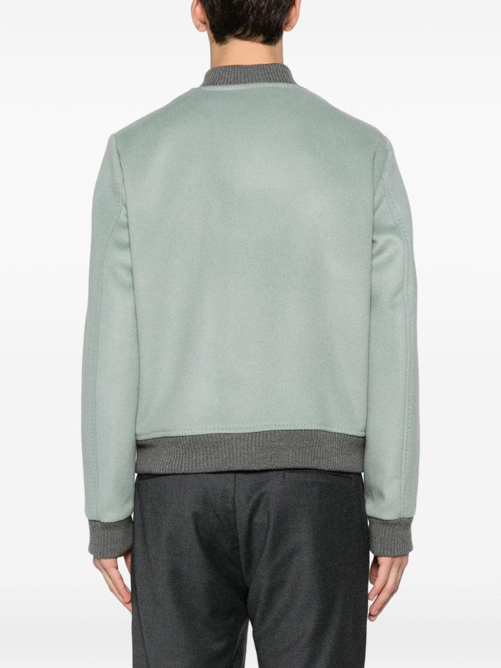 Bomber verde con bottoni 