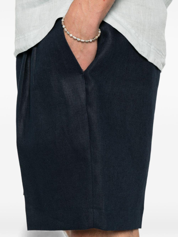 Shorts navy con pieghe 