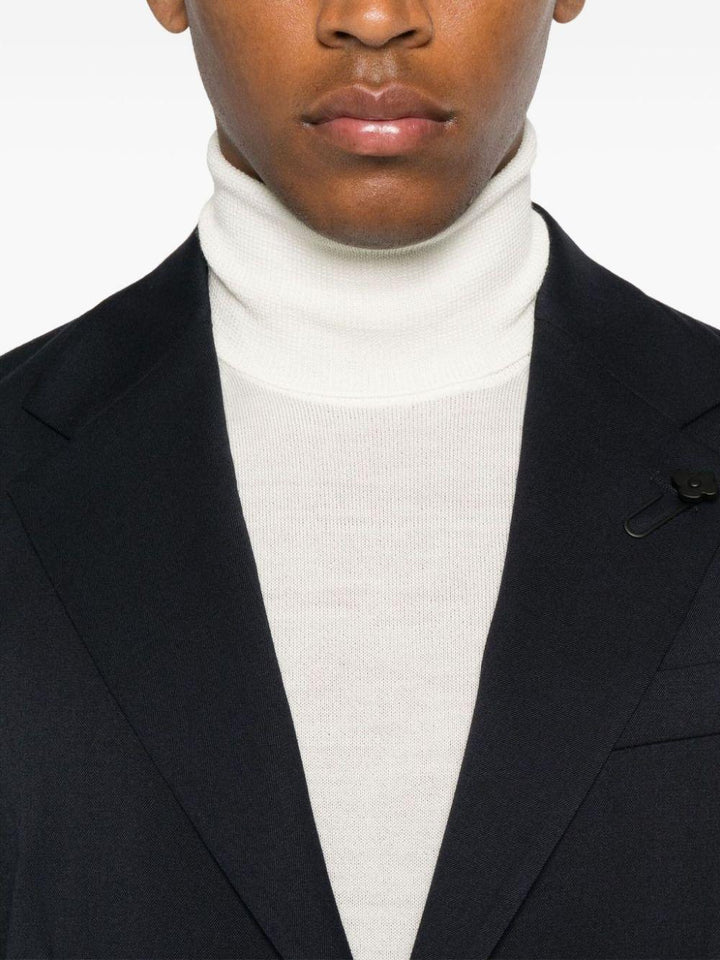 Maglione bianco opaco a collo alto in lana merino