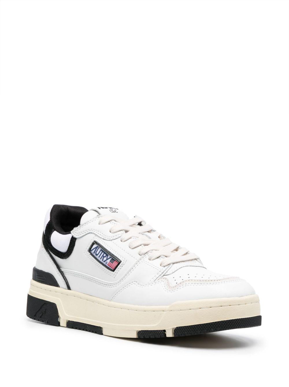 Sneaker action bianca e nera 