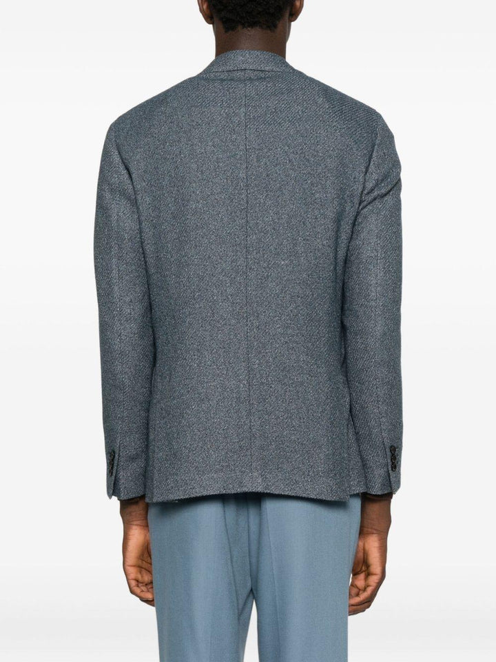 Giacca monopetto blu con revers classici 