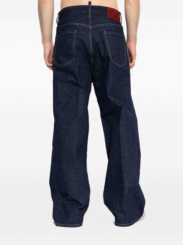 Jeans blu navy a gamba ampia con cuciture a contrasto 