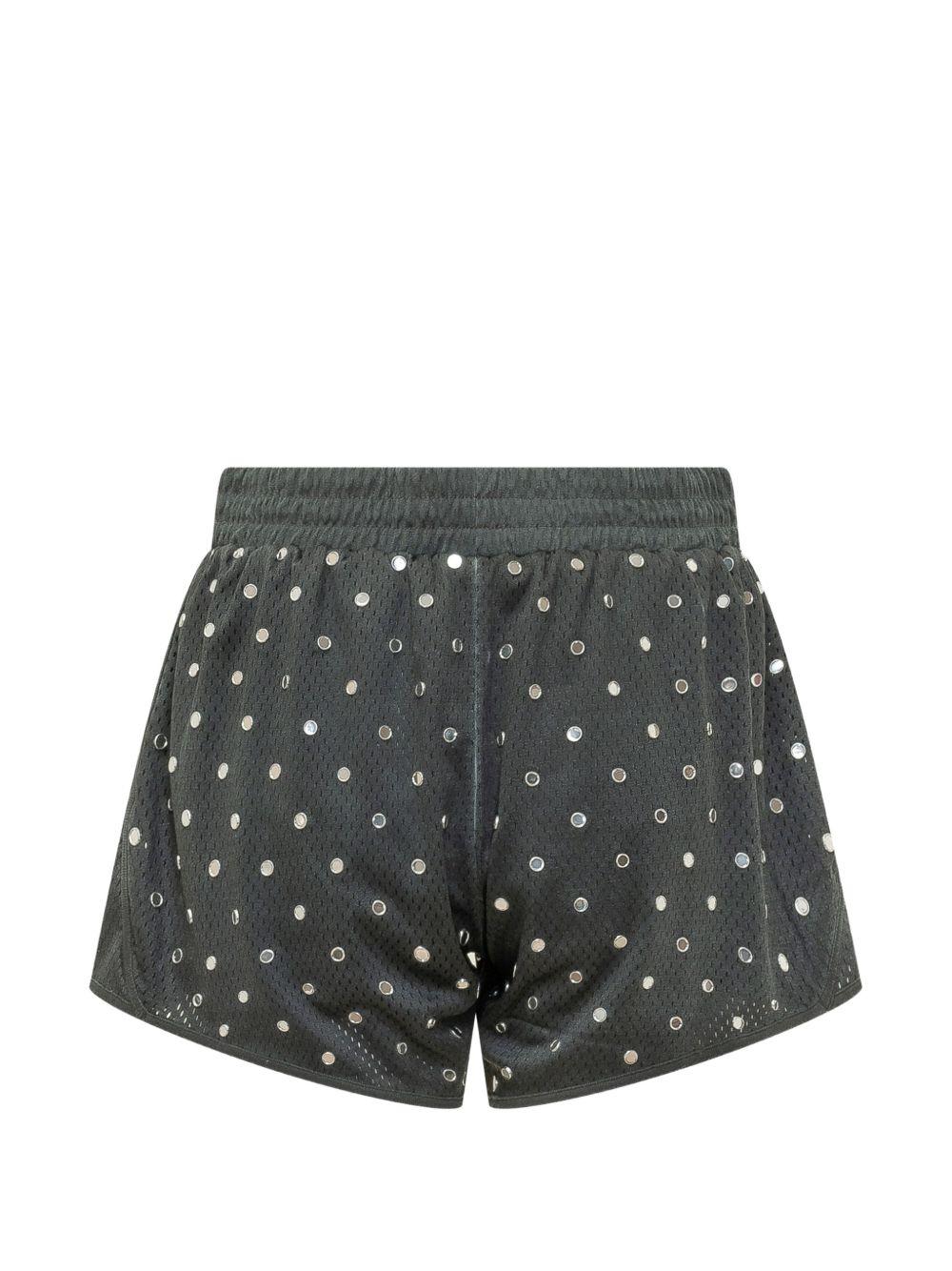Shorts con borchie 