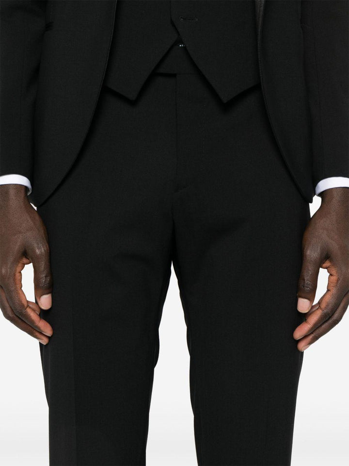 Smoking nero con revers a lancia 
