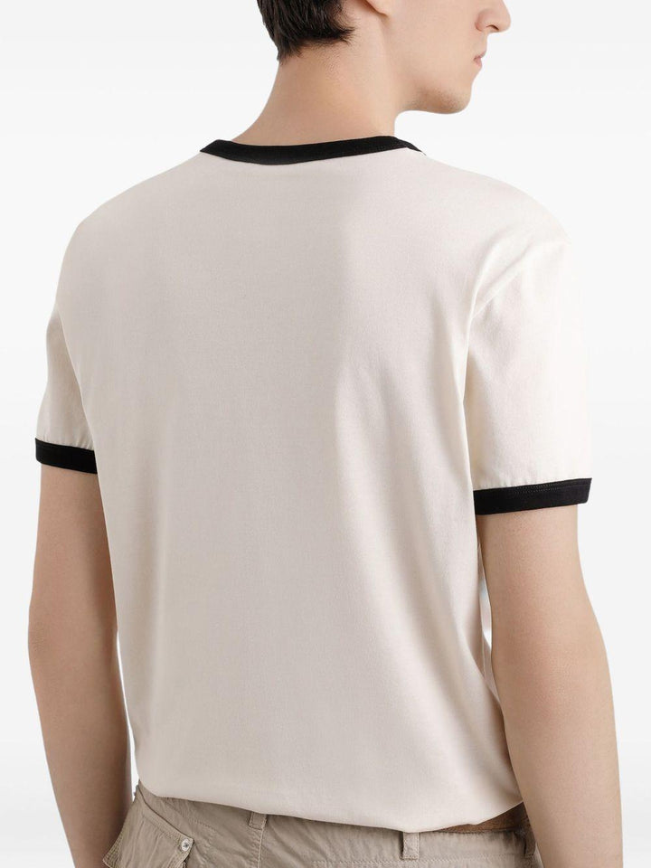 T-shirt bianca con grafica e orlo nero 