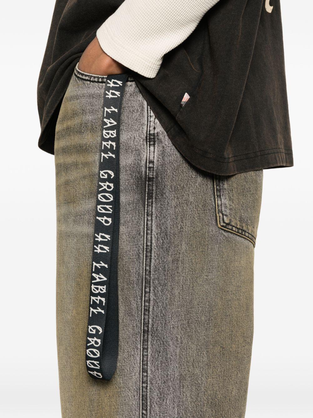 Jeans green con cinturino 