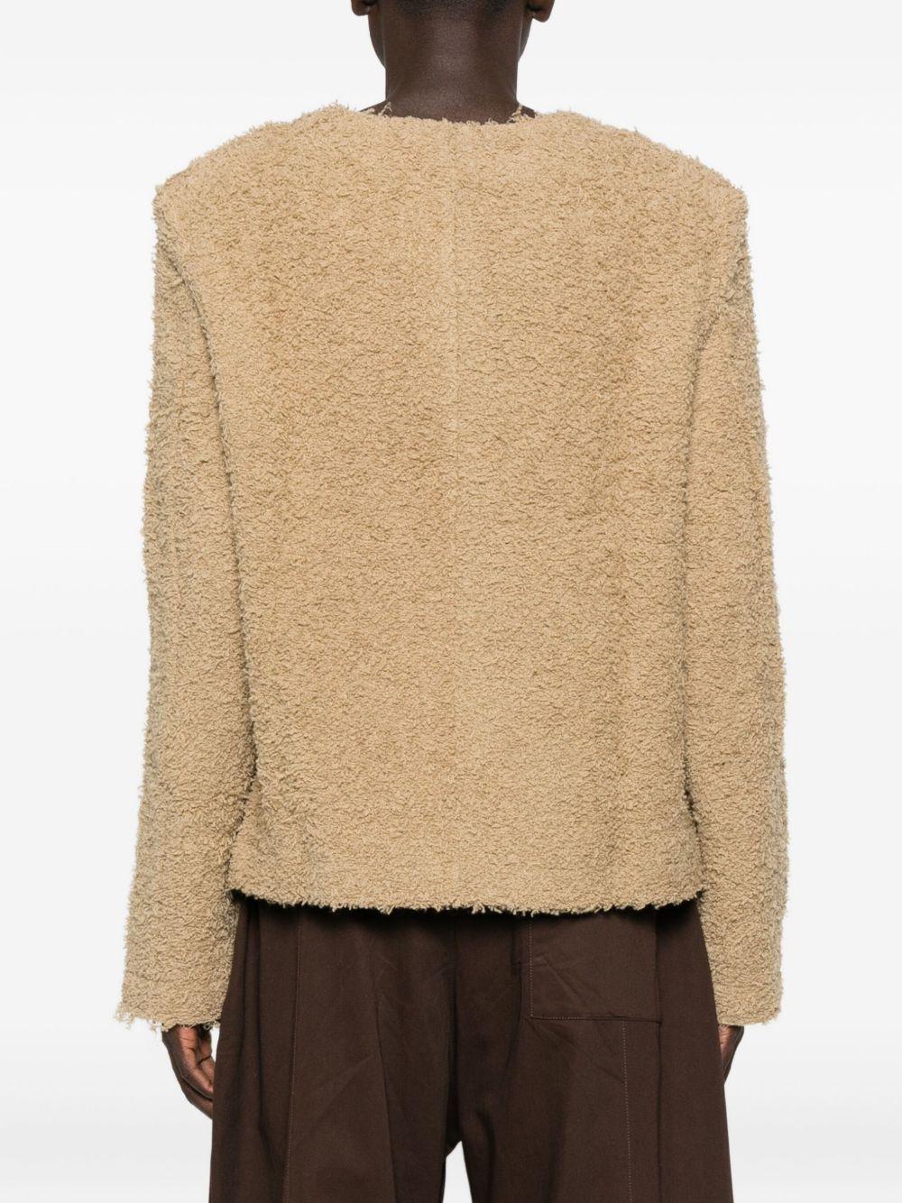 Maglione con scollo a V beige 