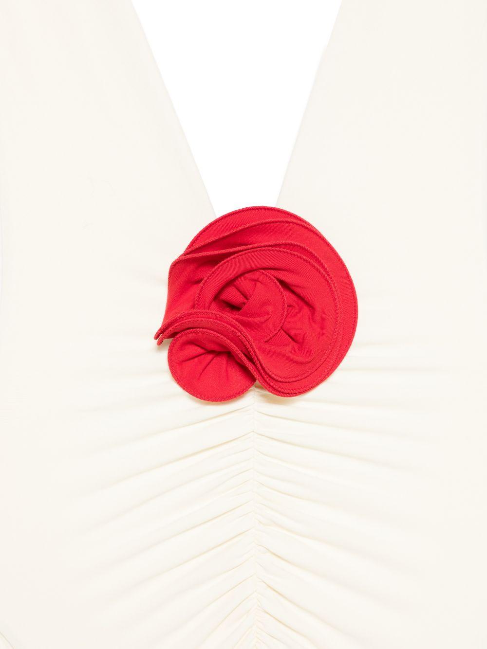 Costume intero con rosa 