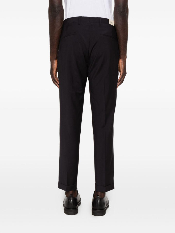 Pantaloni sartoriali blu navy con pieghe 