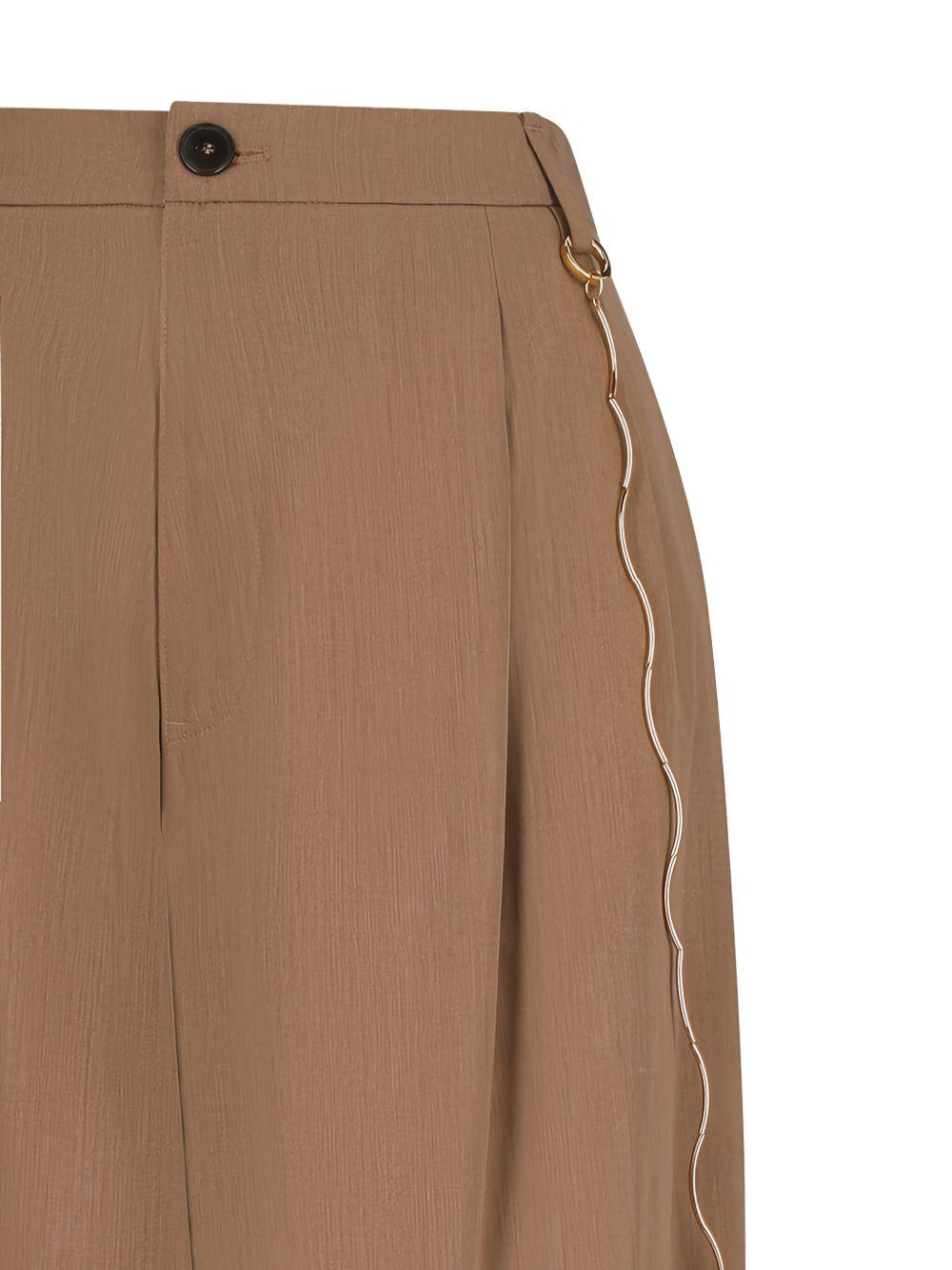 Pantaloni con decorazione 