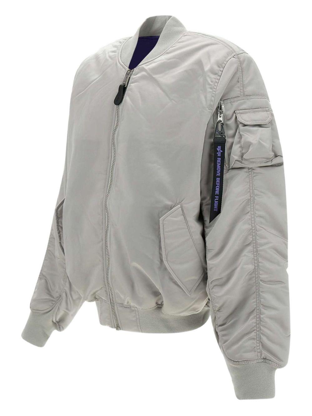 Bomber grigio con zip 