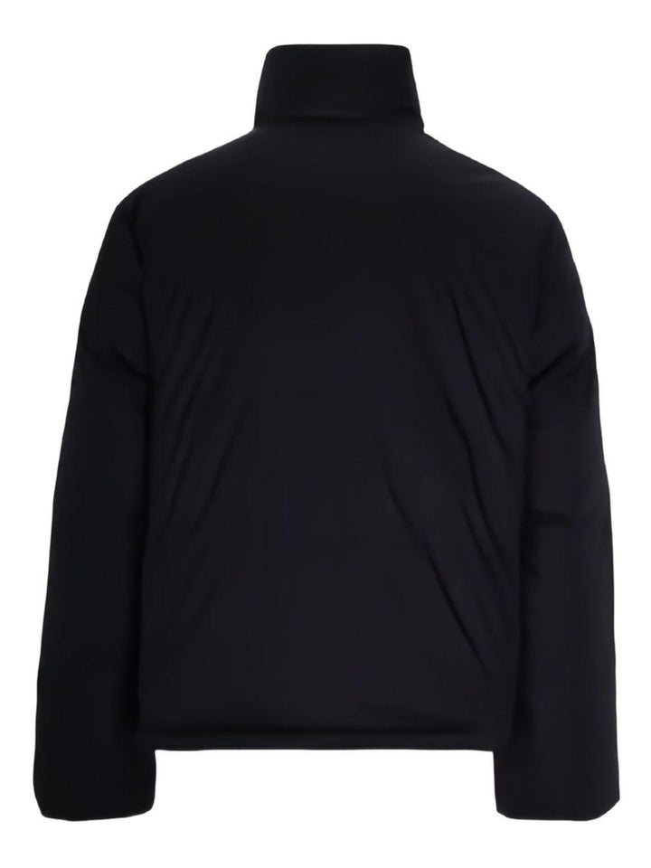 Piumino nero collo alto con lacci 
