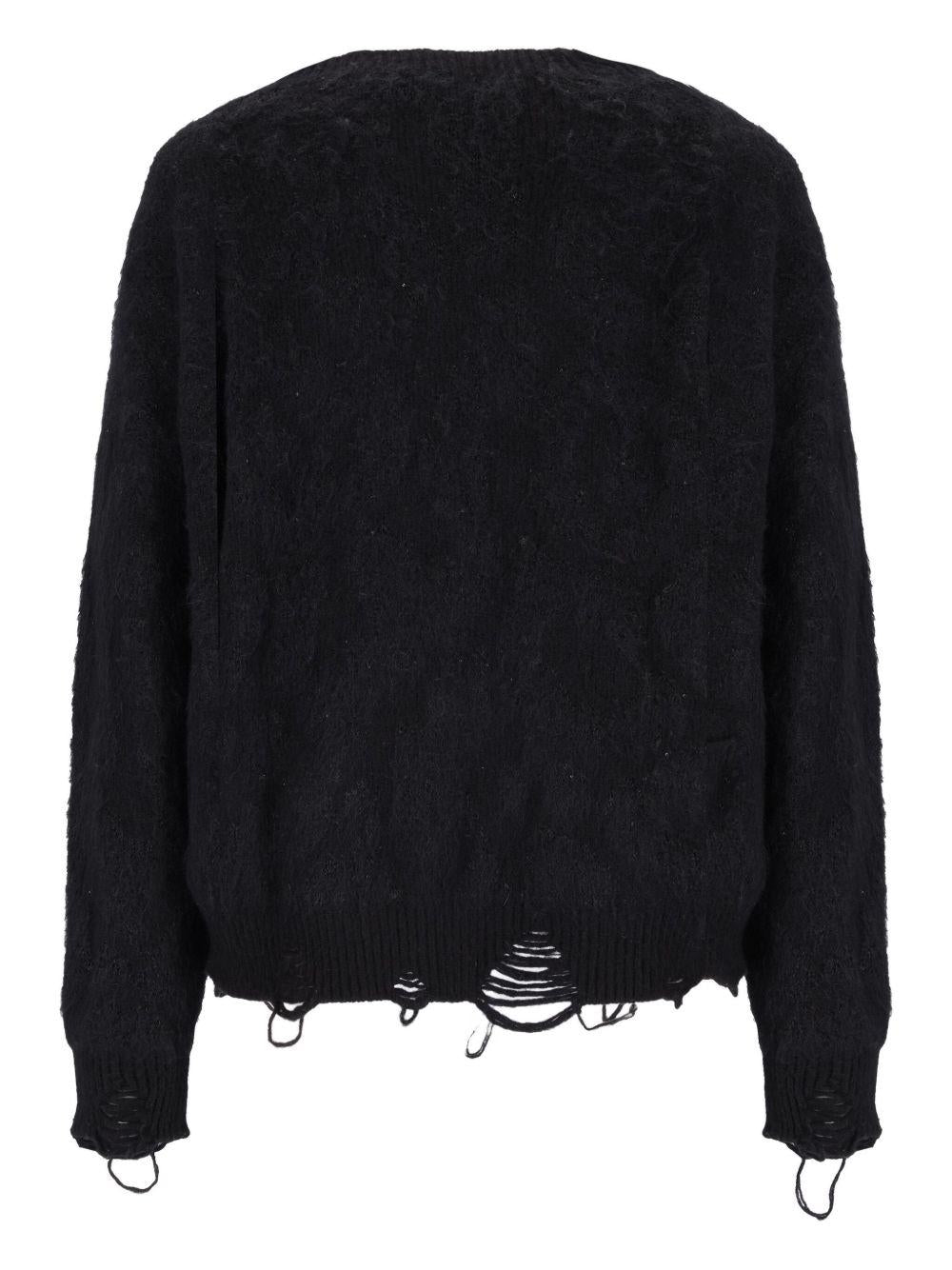 Cardigan nero con effetto vissuto