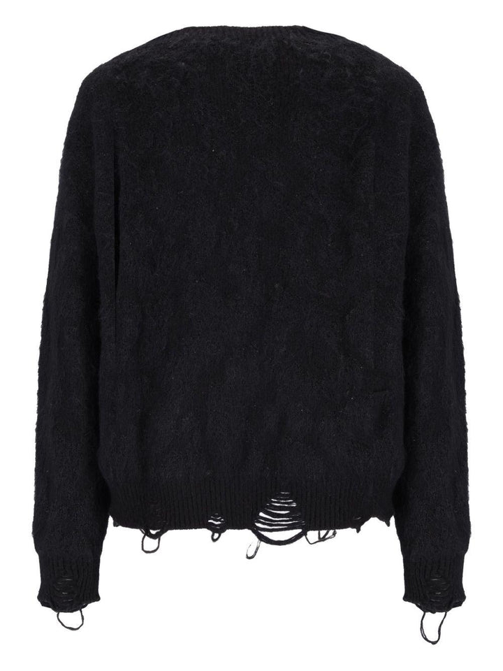 Cardigan nero con effetto vissuto