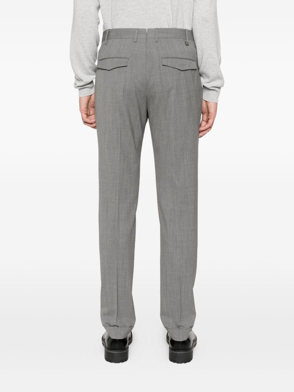 Pantaloni grigi con chiusura nascosta 