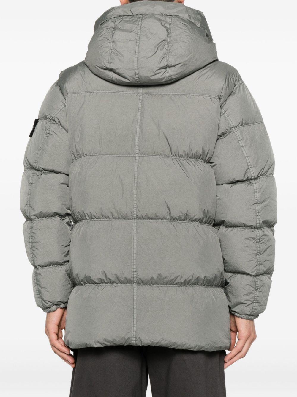 Cappotto grigio con cappuccio e coulisse in vita 