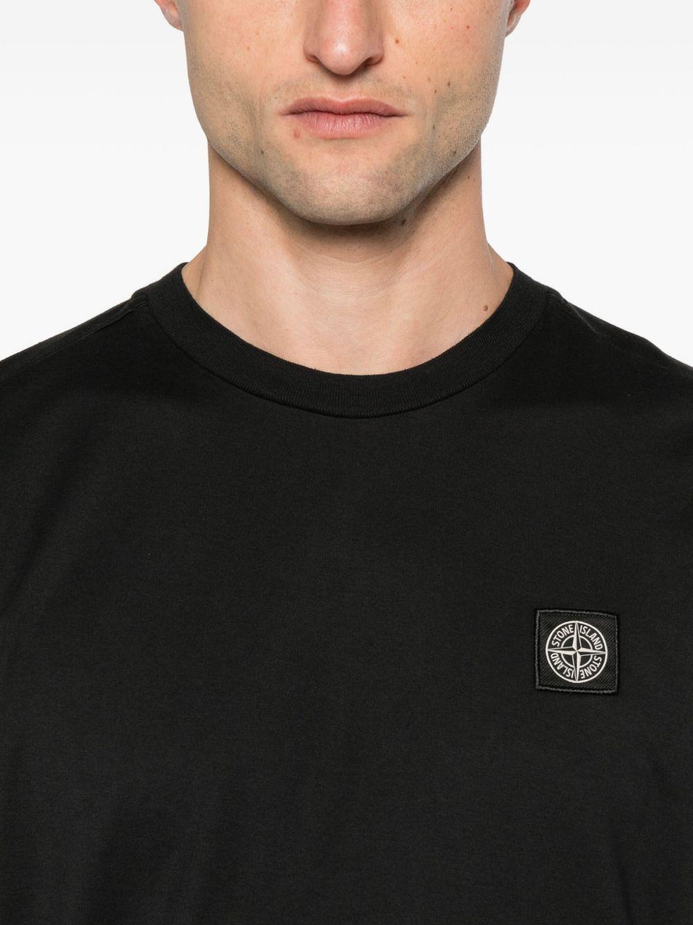 T-shirt nero con applicazione logo 