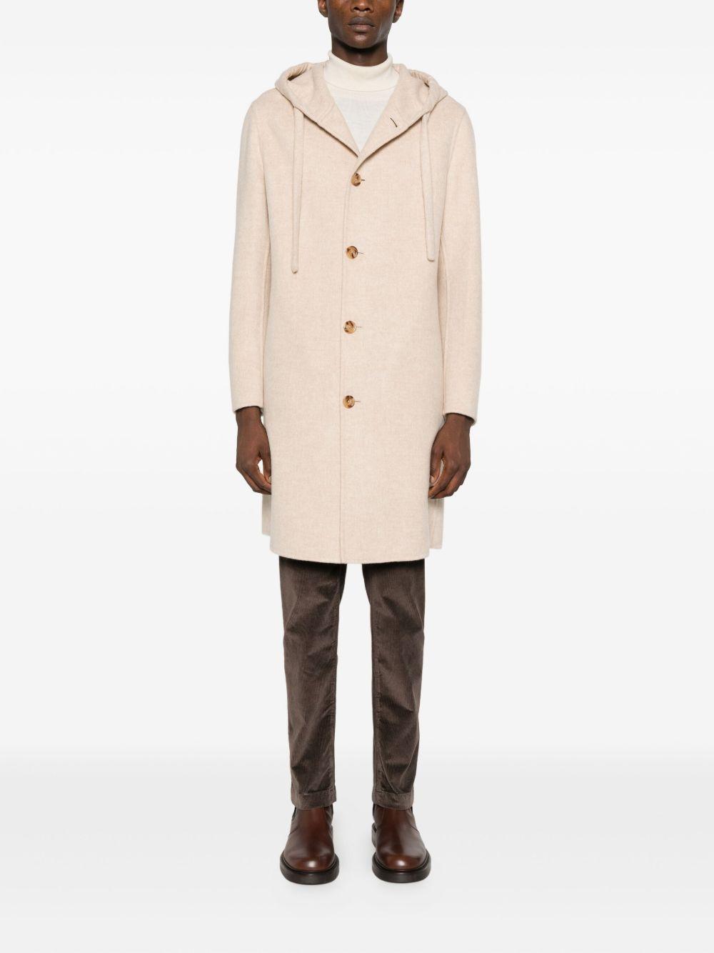 Cappotto beige chiaro con cappuccio 