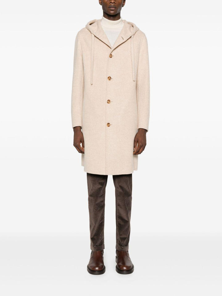 Cappotto beige chiaro con cappuccio 
