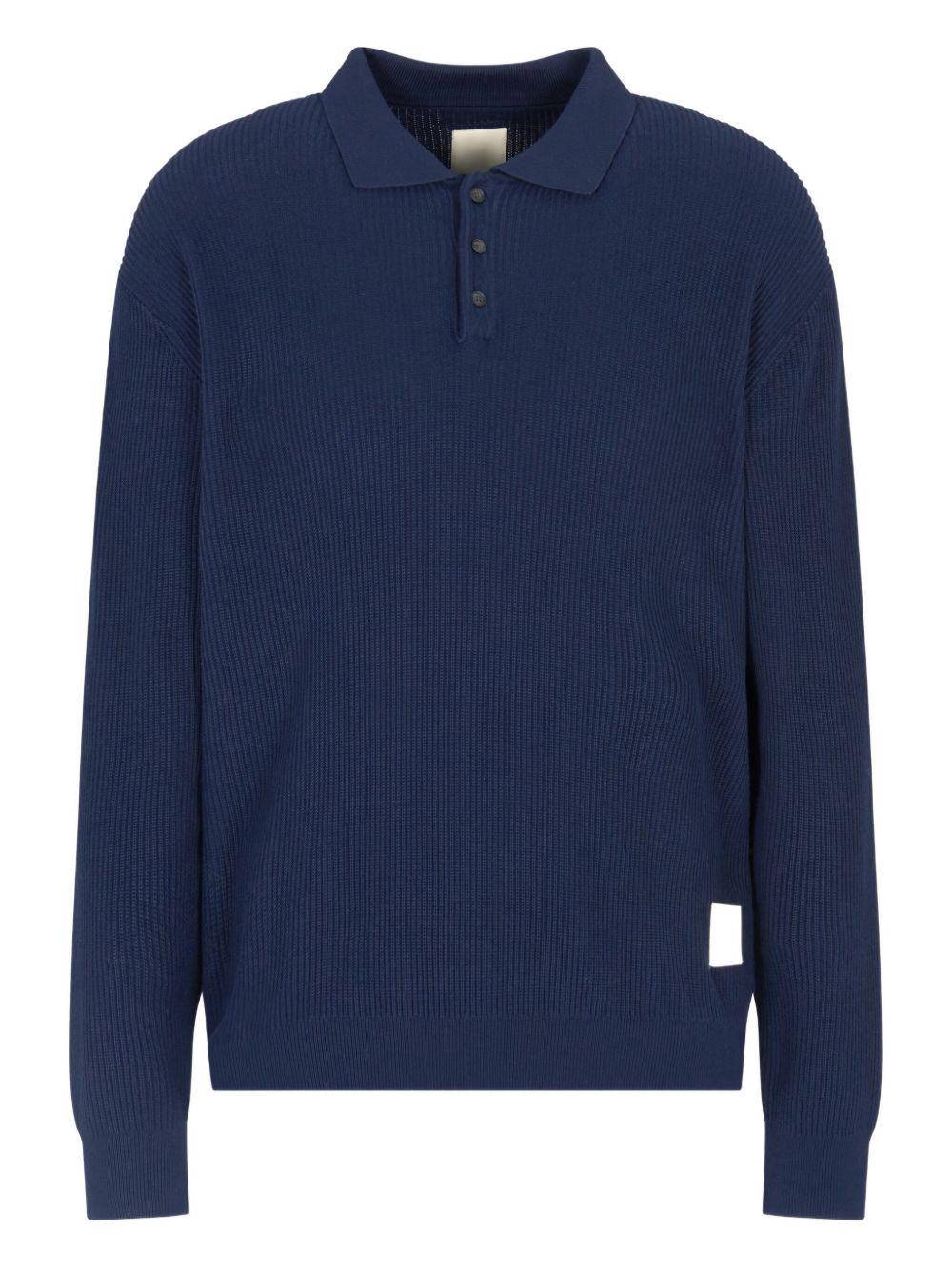 Polo blu con applicazione logo 