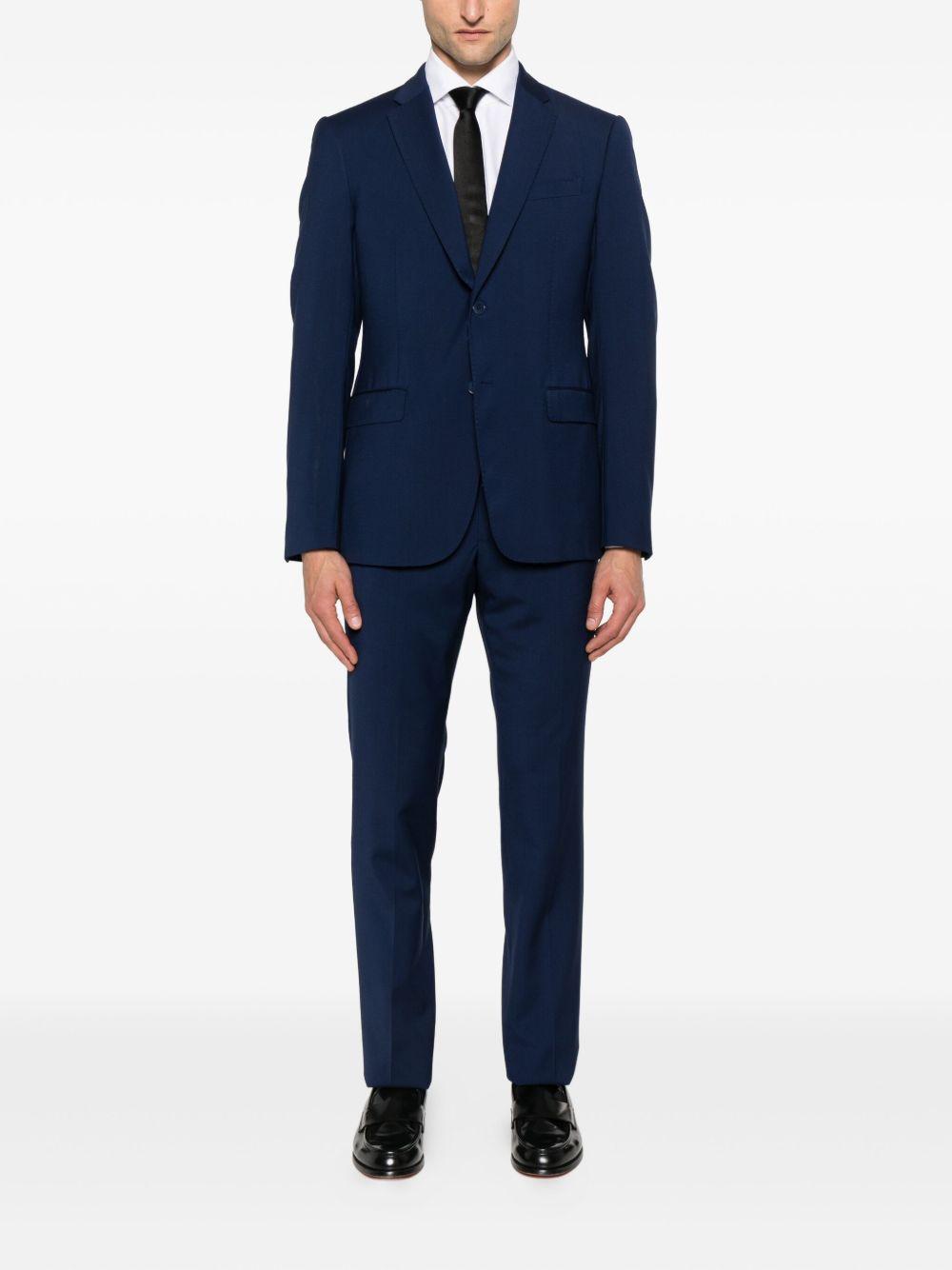Completo monopetto in lana vergine blu 