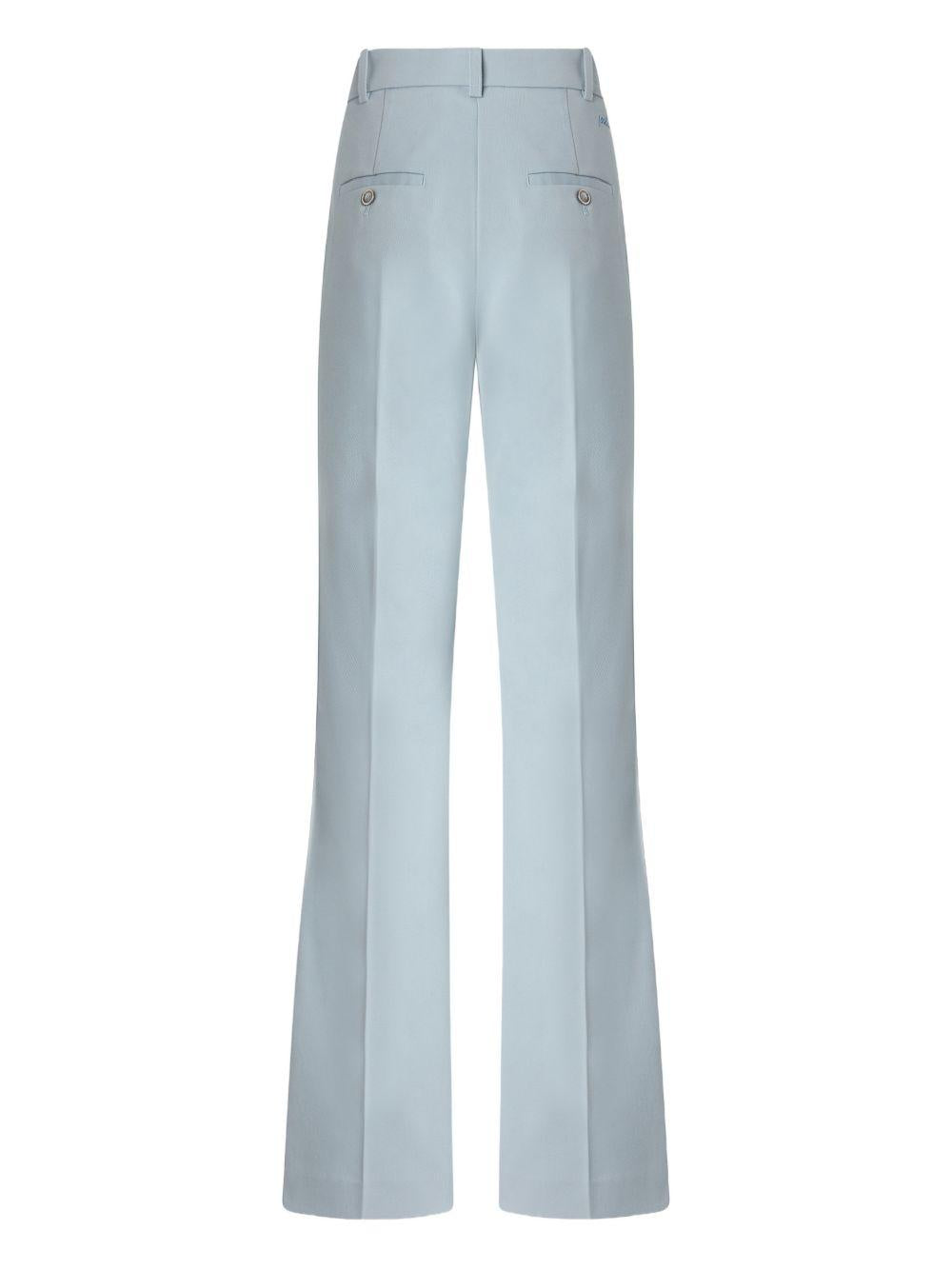 Pantaloni con bottoni 