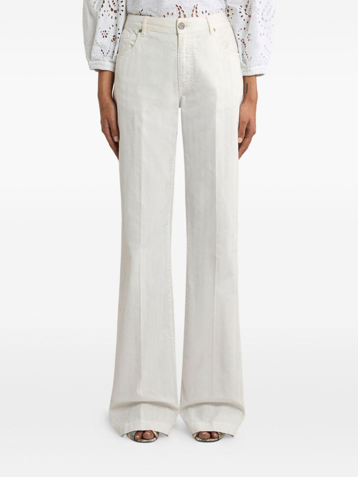Jeans con ricamo Pegaso 